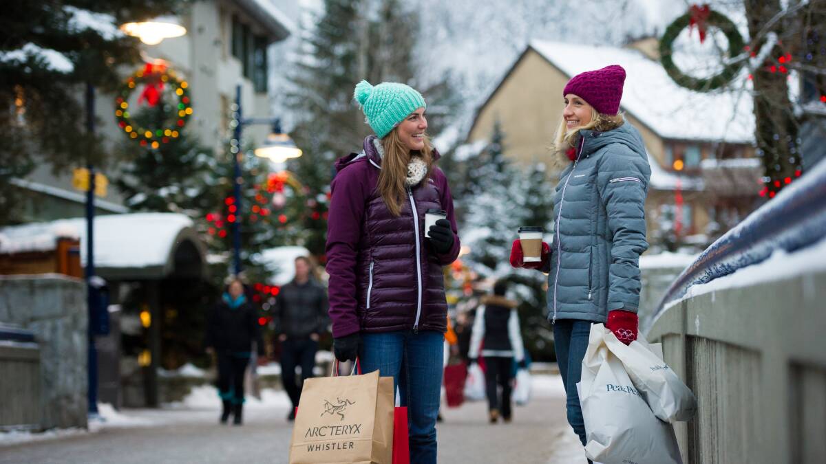 The chill in the air is no match for the excitement of Christmas gifting. PIC: Tourism Whistler, Mike Crane