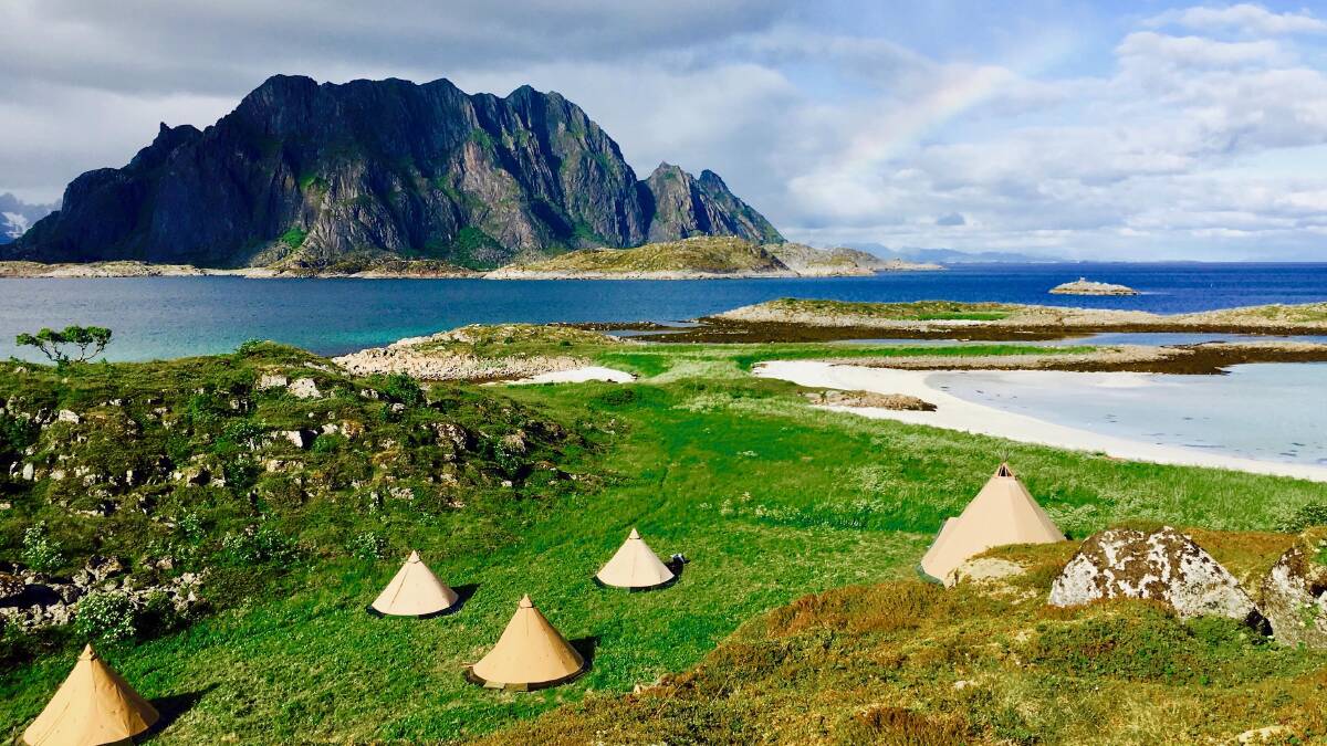 Wake up to the Arctic mountains … glamping in Lavvus on the Lofoten Islands.