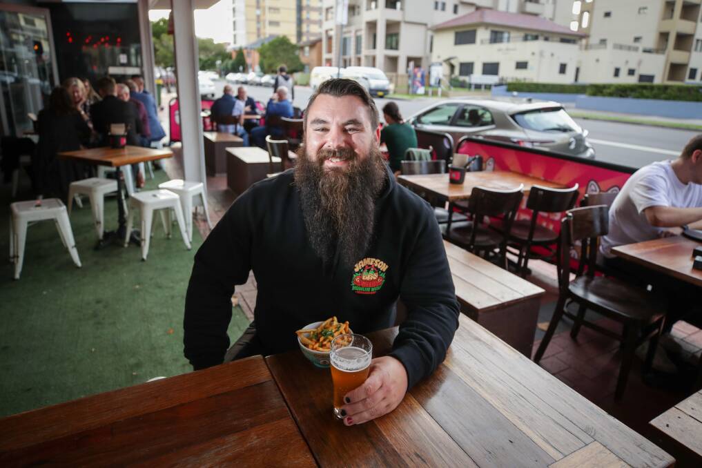 Help: Good Times Only co-owner Luke Symons at Dagwood's outdoor area, which took advantage of Wollongong City Council's waiver of outdoor dining fees. Picture: Adam McLean.