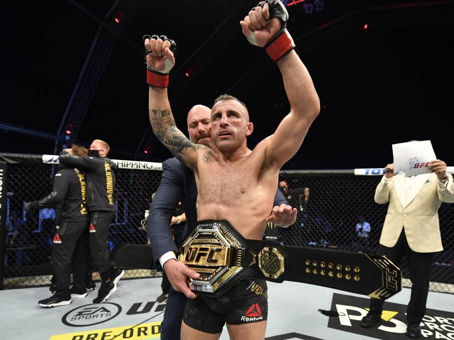 AND STILL: Alex Volkanovski retained his UFC title with a split-decision win over Max Holloway last July. Picture: Getty Images