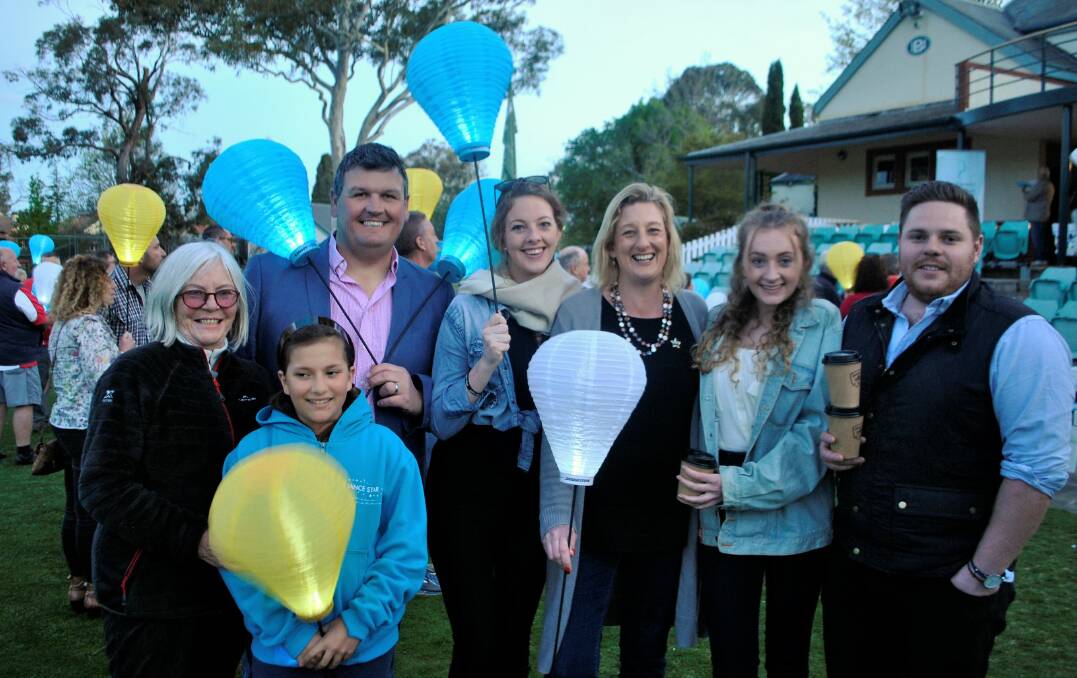 GLIMMER: Alex Neilsen (centre) stands with her family, Sam Neilsen, Lucy and Sophie Capel, and friends, Marlies and Angelina. Photo: Charli Shield.