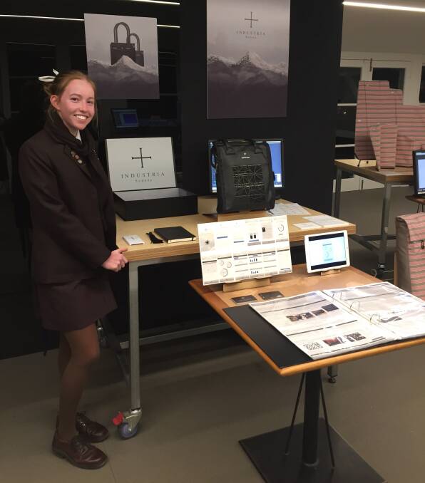 Innovation: Frensham graduate Sarah Hassett with her Design and Technology portfolio, for which she came 6th in the state. Photo: Supplied.