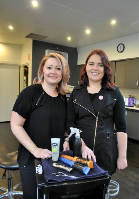 SKILL UP: Jen Auon (left), owner of B-Tempted salon in Mittagong is taking apprentice hairdresser Tahlia Nonnenmacher (right) on the trip of a lifetime. Photo: Charli Shield. 