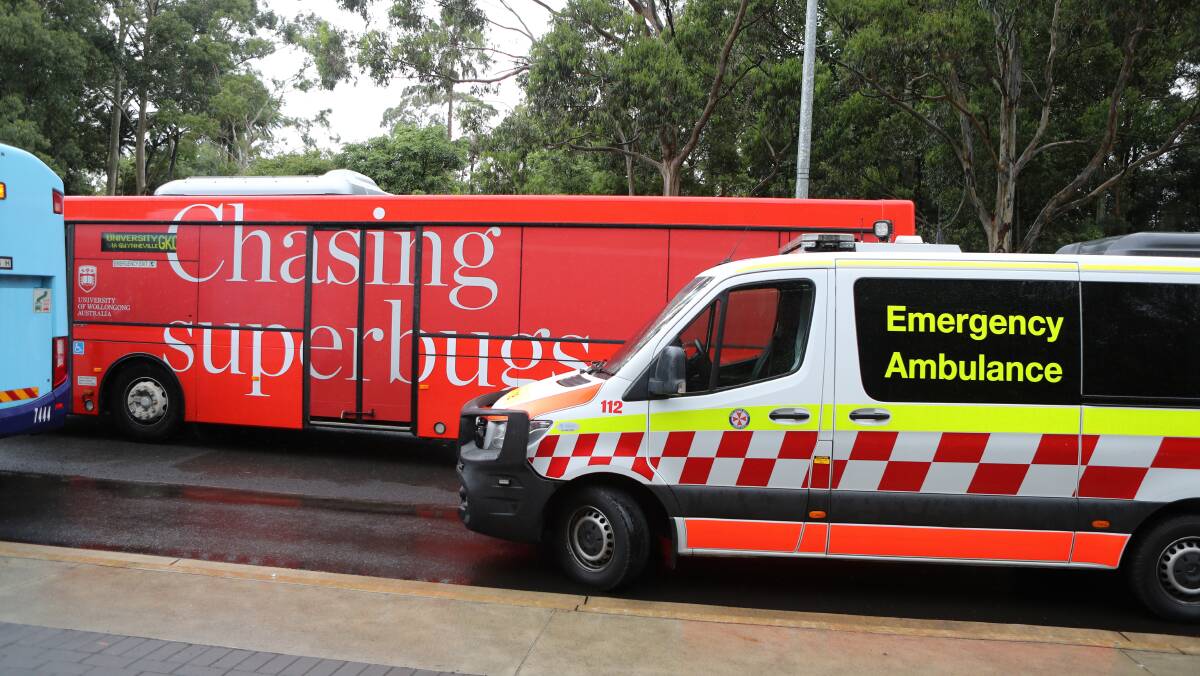 An ambulance crew arrived at the University of Wollongong campus about 10am. Picture: Robert Peet