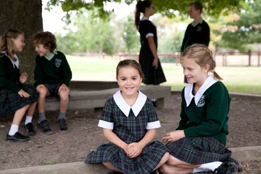 HAPPY HEARTS: There are lots of smiling faces at Southern Highlands Christian School.
