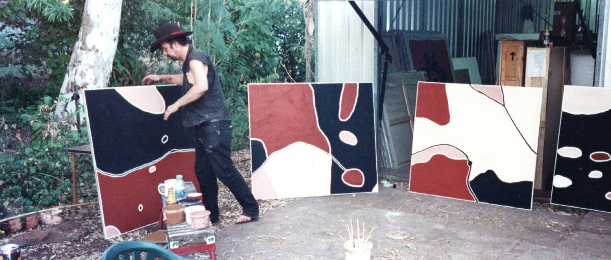 Tony Oliver with works by Freddie Timms, Ironwood Drive, Kununurra, 2002. Picture: Giancarlo Mazella