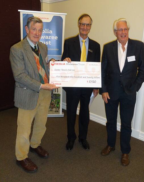 HAND OVER: Michael Darlow along with Veoilia Trustee John Reynolds and David Haines receiving the cheque for $5,920.00. Photo supplied. 