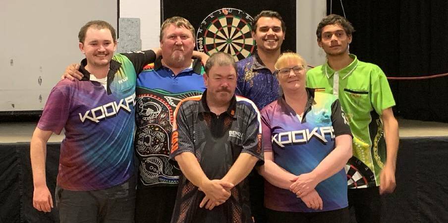 ALL SMILES: The Mittagong District Darts Association players will be all smiles on news the game they love will return.