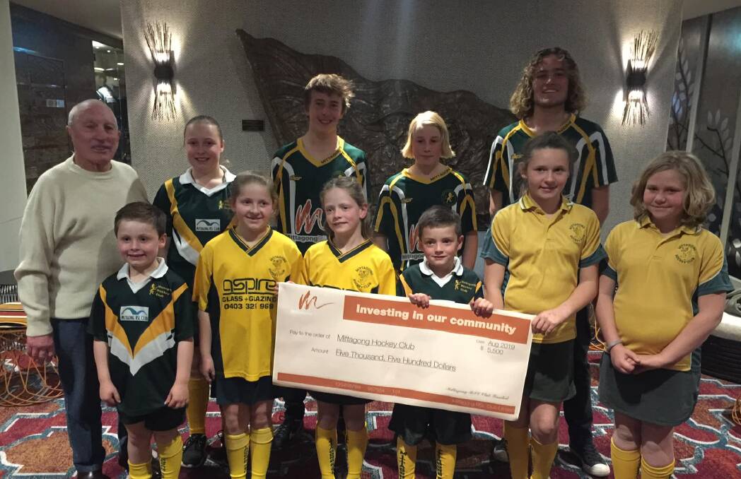 SLAPPING SUCCESS: The Mittagong RSL donated $5500 to the Mittagong Hockey Club which will go towards new equipment. Photo supplied. 