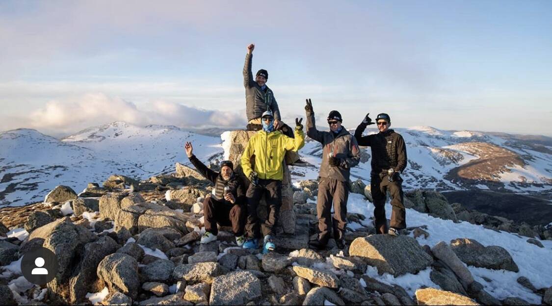 STRENGTH IN NUMBERS: Sam Tait and his mates celebrating at the summit of Mount Kosciuszko. 