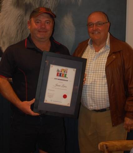 VP NOW A LIFE MEMBER: Jason Lewis being inducted as a 4K life member by chairman, Tony Springett. Photo: 4K.