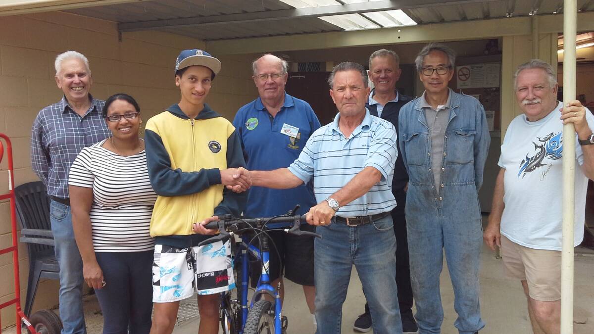 Reilly and his mother Kelani, with some of the Colo Vale Village Men's Shed members. Photo: supplied
