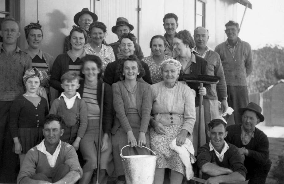 HILL TOP WORKERS: A village group after having cleaned the Community Hall, probably 1940s. Photo: BDH&FHS