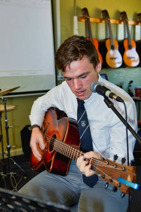 Lachlan Nickl adds a little music to his life. Photo supplied