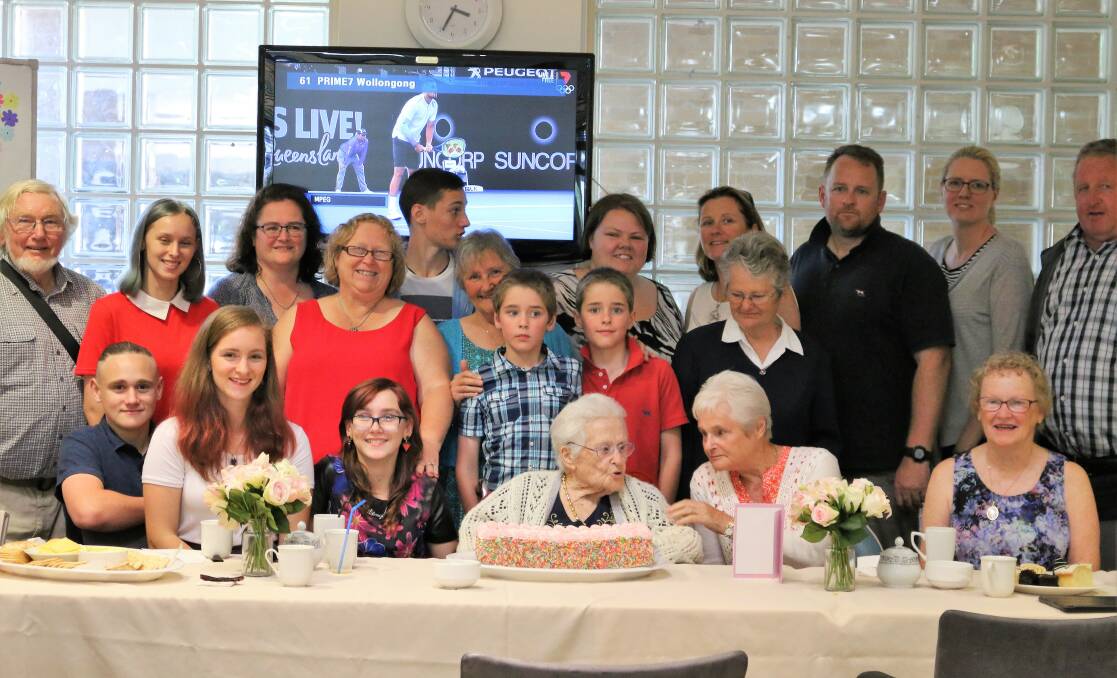Family time: Children, grandchildren and great grandchildren gather for Eileen Veal's 103rd birthday celebration.