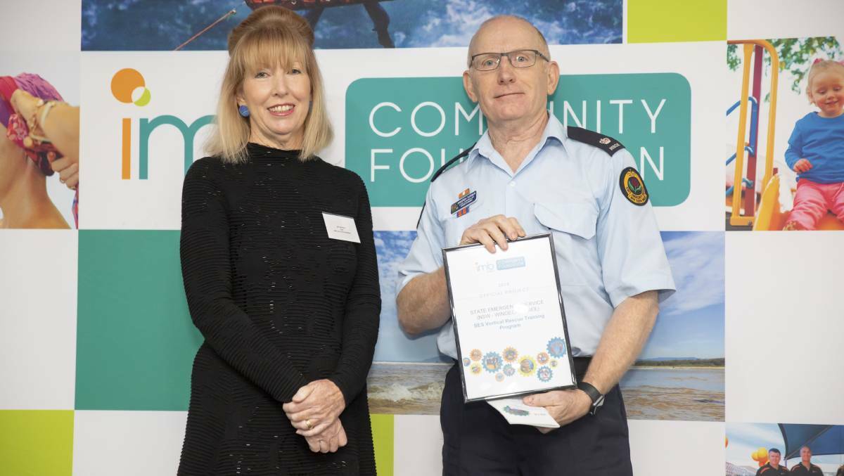 Jan Swinhoe, Chair IMB Bank Community Foundation with Warren Turner, Local Controller, SES Wingecarribee which received funding in 2018 to build a vertical rescue training tower. Photo: supplied