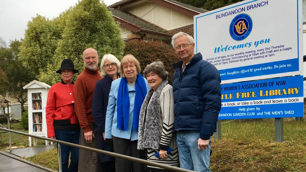 Pictured at the official opening of the the Little Free Library are Garden Club members president Ted Ayers and Tessa Spencer, the CWA's Gwenneth Humphrey and president Pam Newnham and Evan Smith from the Men's Shed. Photo supplied