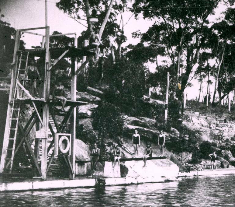 IN USE: Mittagong Baths in mid 1930s, with diving tower and boards in action. Photos: BDH&FHS