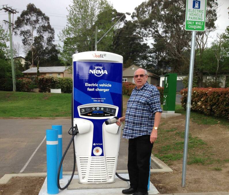 A motorist prepares to charge their electrical vehicle in the Mittagong RSL car park. Photo: supplied