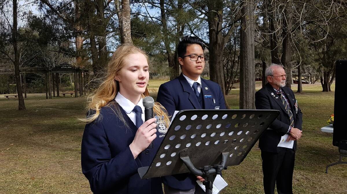 Bowral High School students address the crowd at the Southern Highlands Vietnam Veteran's memorial service for the 53rd anniversary of the Battle of Long Tan.