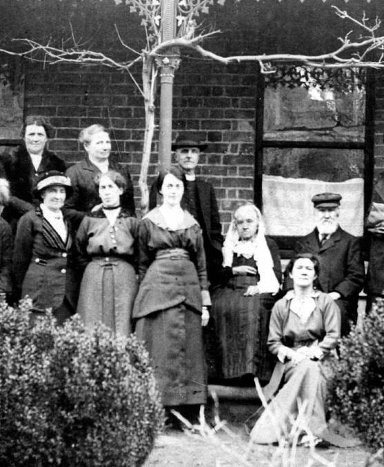  COMMUNITY SPIRIT: An elderly George and Dinah Osborn (at right) with some members of Bundanoon Holy Trinity Ladies Auxiliary, c1910. Photos: BDH&FHS
