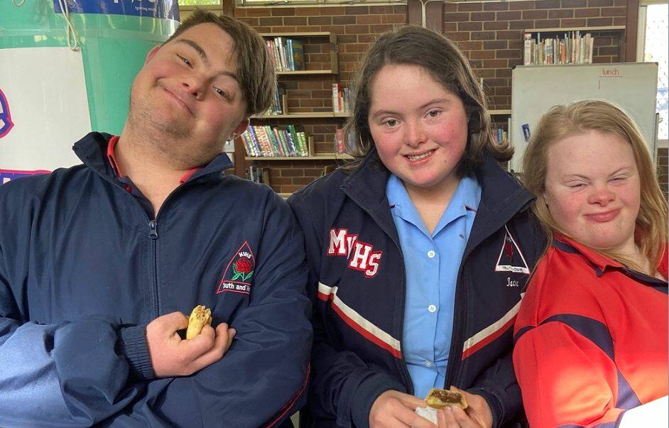 Liam Youkhana, Jacinta Longhurst and Lucia Basaglia members of the Year 12 Support Unit, enjoying a special morning tea for Year 12 students. Photo supplied