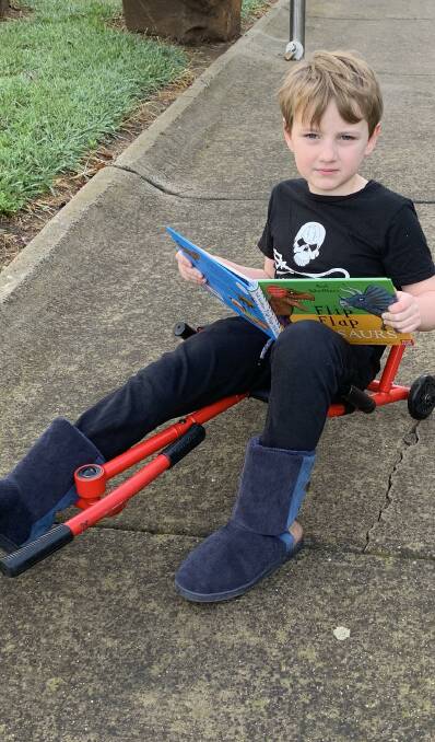 Billy Nicholson, 6, combines hoe school learning with exercise and fresh air.