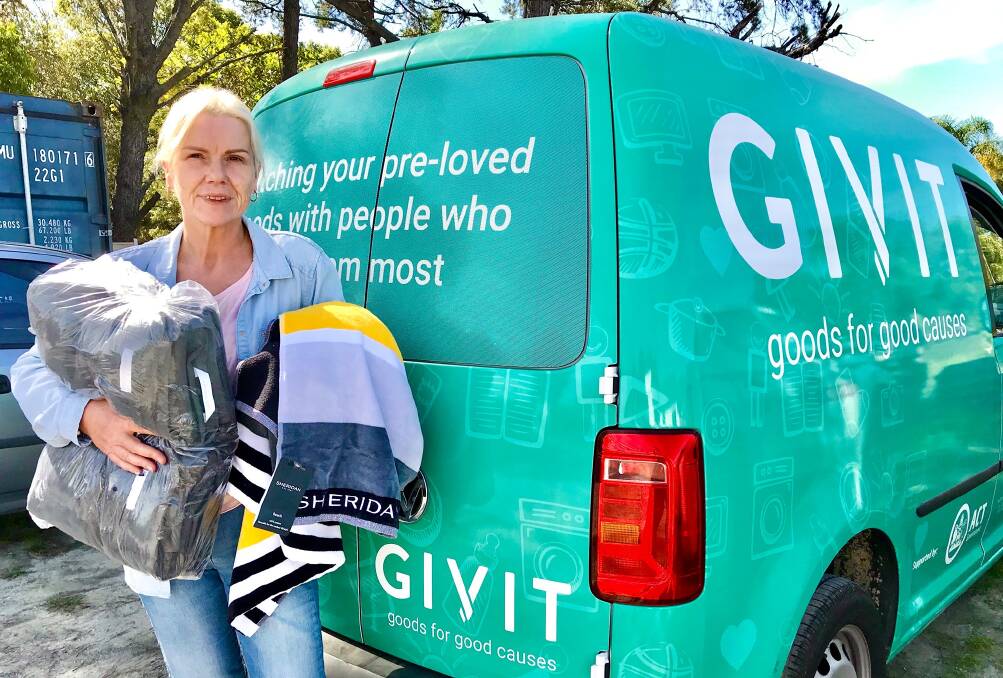 Taking delivery of donations to NSW GIVIT. Photo supplied