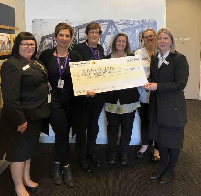 Lisa Long, Sherin Fishwick, Michelle Mulvihill, Sharon Rosman, Alicia Armstrong and Branch Manager Kirsty Peranovic with a cheque for $500 to be donated to Dignity. 