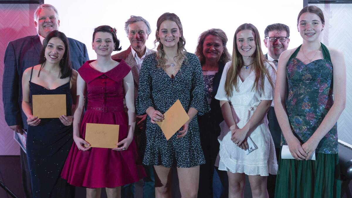 Pictured at the grand final are from left Richard, Javiera, Amelia, Nicholas Hammond, Abbey, Wendy Tuckerman MP, Cassidy, Glenn Amer, Ashleigh.