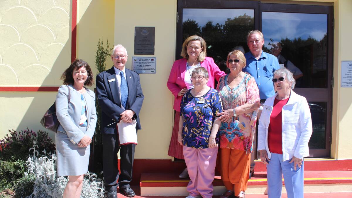 Goulburn MP Wendy Tuckerman unveils a new plaque at the new-look Robertson School of Arts hall. Photo supplied