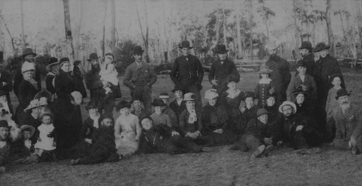 EARLY TOWNSFOLK: A gathering of Bundanoon villagers, c1885. George Osborn is front right.