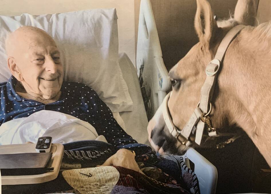 John Johnston OAM had loved horses all his life. He received a special visit from a horse shortly before his passing while in a Southern Highlands Nursing Home. Photo supplied