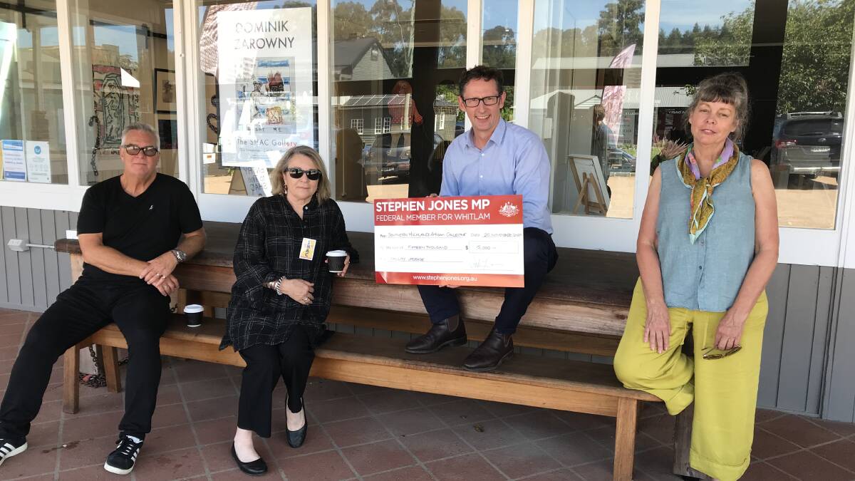 Member for Whitlan Stephen Jones with a $15,000 check handed over recently toSHAC committee members from left director Jeremy Perrott, vice president and galleries manager Gail Miller and president and artistic director Jane Cush.