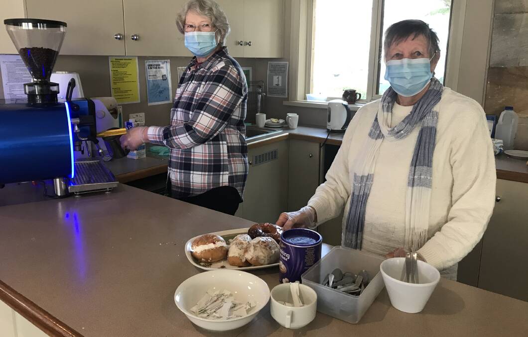 Volunteers Judy and Rose are kept busy in the kitchen for Friday morning tea at St Stephens Anglican Church in Mittagong.