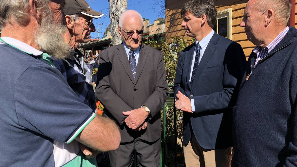Mayor Ken Halstead and Hume MP Angus Taylor welcome federal government funding to host extreme weather workshops for the elderly in the Wingecarribee Shire. Photo: supplied