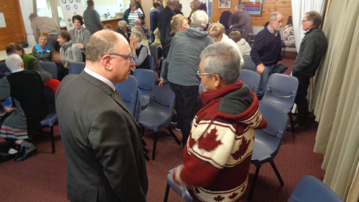 Doug Faircloth speaking to Dr. Ben Lim at the Robertson Age Friendly forum. Photo: supplied