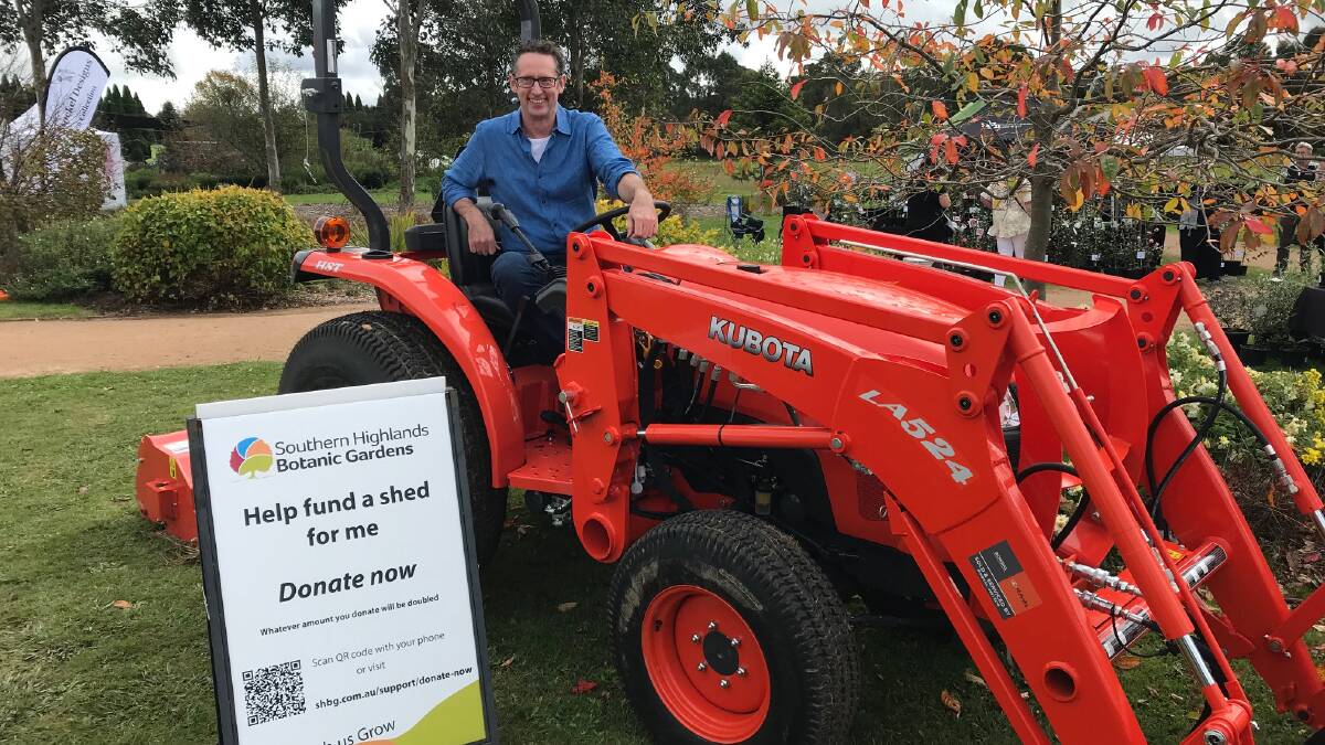 Whitlam MP Stephen Jones takes a closer look at the Southern Highlands Botanic Gardens new tractor.