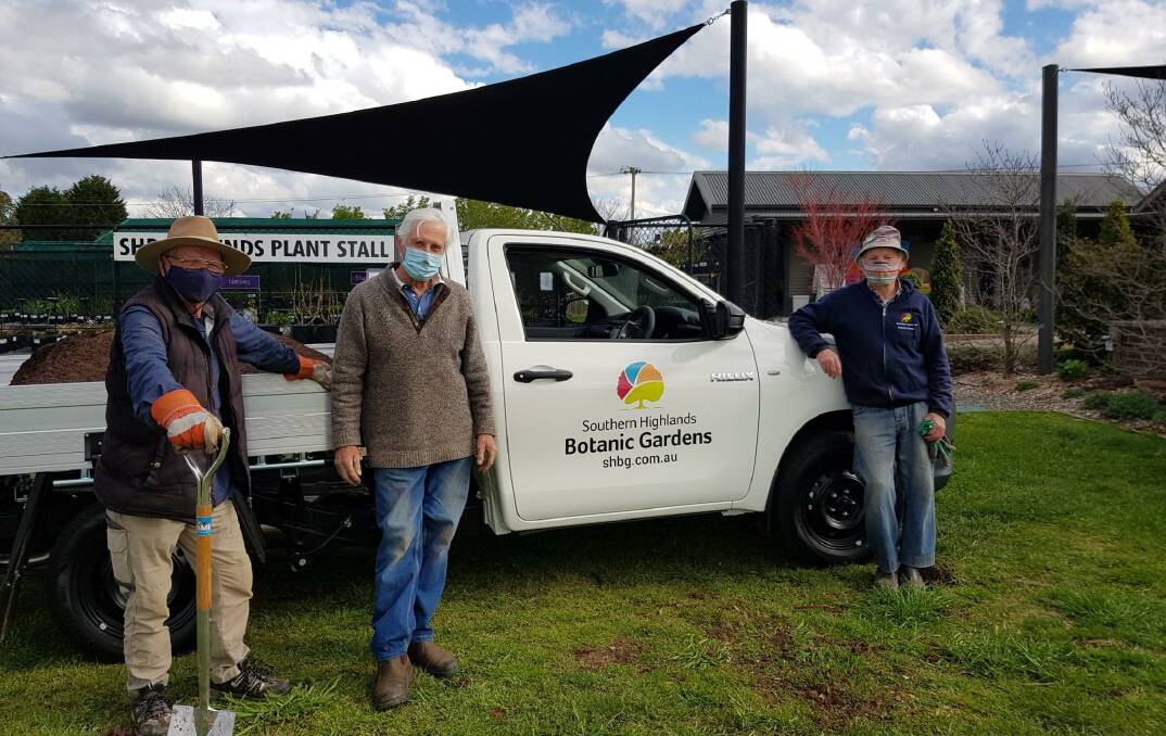 Southern Highlands Botanic Gardens volunteers Chris O'Brien, Peter Scott and Alan Gilbert with the new ute. Photo supplied