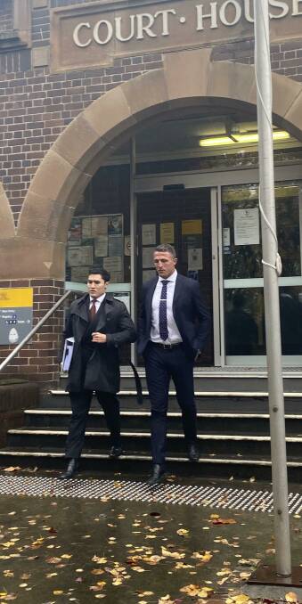 Lawyer Bryan Wrench and his client former NRL player Sam Burgess.