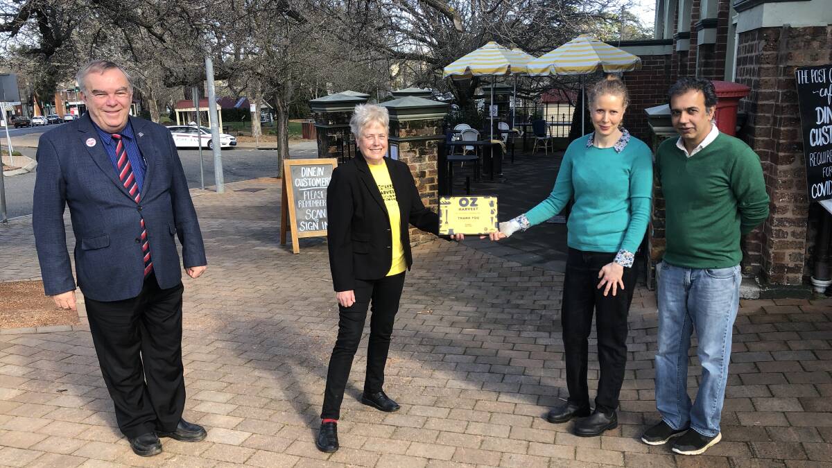 DONATION: The Post Office Cafe donated a commercial fridge to OzHarvest. It was facilitated by Councillor Ian Scandrett. Photo: supplied. 