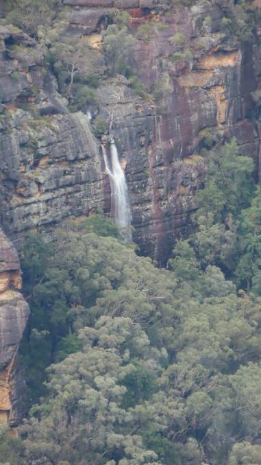 Down the escarpment: Recent rainfall has created a waterfall feature. Picture: Andy Carnahan.