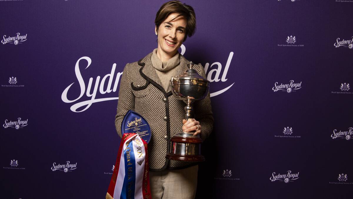 Cressida Cains, Owner of Pecora Dairy, with her award on presentation night. Photo credit is Monde Photography.