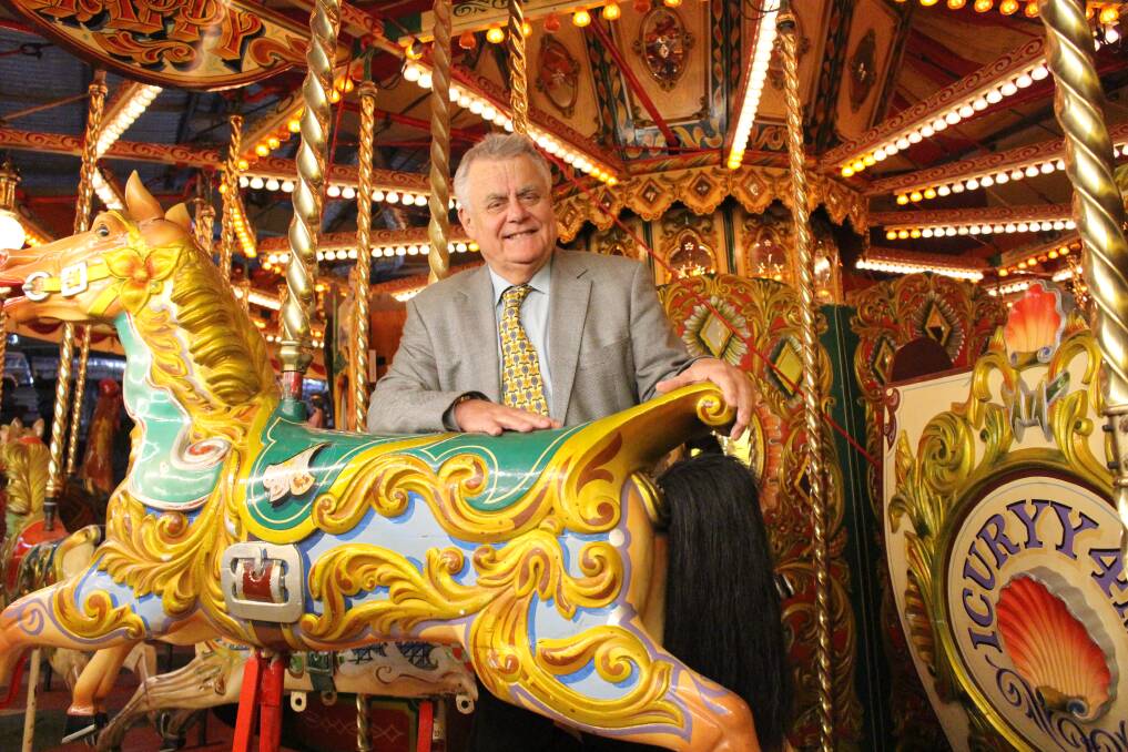 Mechanical music enthusiast and Fairground Follies owner Craig Robson with the stunning Carousel which is more than 100 years old. Photo: Vera Demertzis 