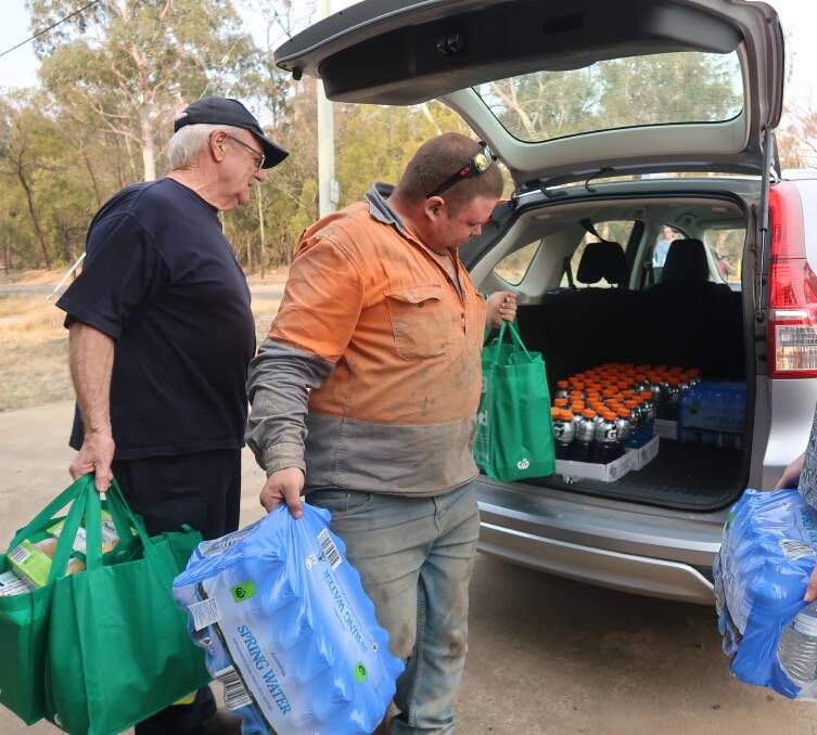 A car load of supplies were delivered to the Berrima Fire Brigade on Wednesday evening. Photo: Vera Demertzis