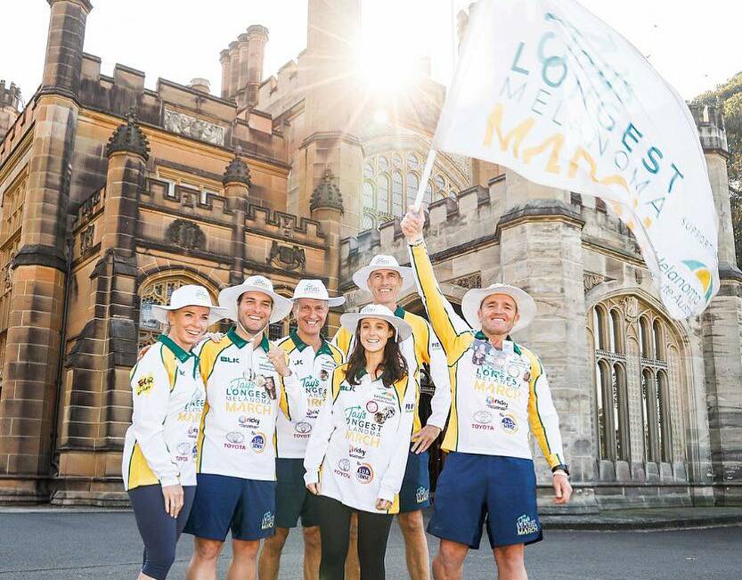 Finishing line: Jay and his team celebrate his 2000km, 50 day walk from Adelaide to Sydney. Photo: supplied. 