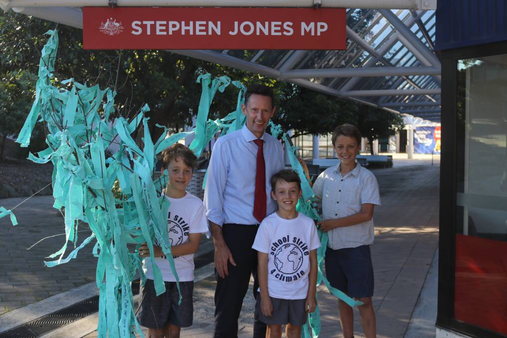 Message received loud and clear: The sculpture was delivered to Stephen Jones' office, where they had a chat about climate change. Photo: Supplied. 