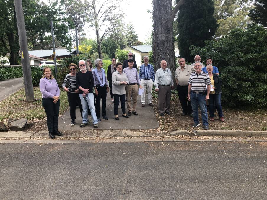 Concerned: Residents gathered for a street meeting to discuss the proposed closure of Waverley Parade from Stanley Street to Range Road. Councillor Ian Scandrett met with the group to hear their concerns. Photo: supplied. 