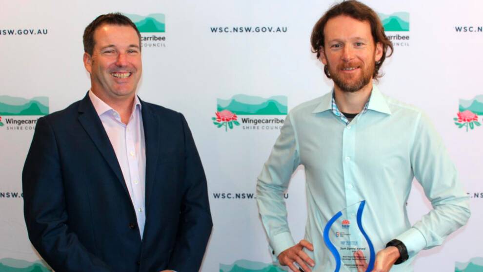 Executive Officer from the Water Directorate Brendan Guiney (left) presents Councils Manager of Assets Stace Lewer with the Sam Samra Award. Photo: supplied
