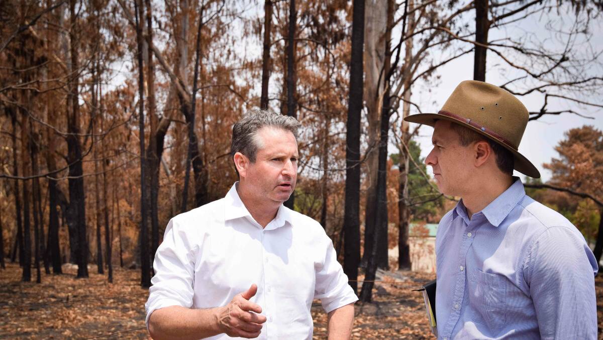 Mr Warren and Mr Clare inspect bushfire ravaged Wollondilly. Photo: supplied. 